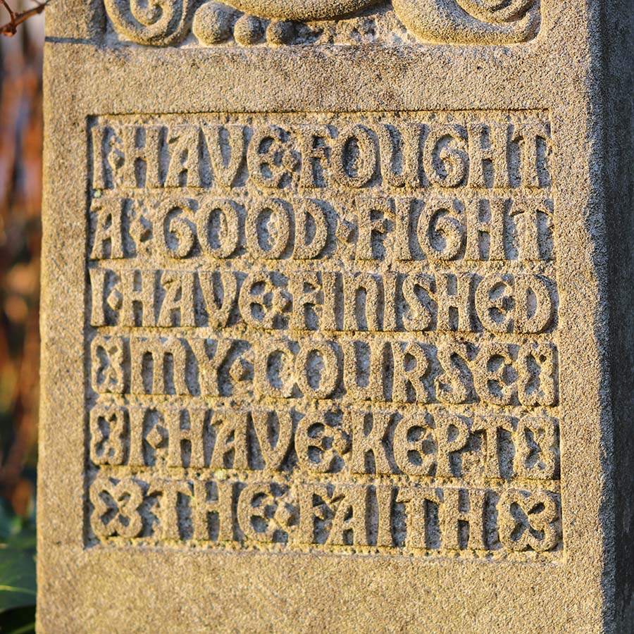 fought_good_fight A stone carving with intricate details reads, “I have fought a good fight, I have finished my course, I have kept the faith.”